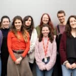 This is picture with me and lab members. Maria (wearing the orange sweater) is my supervisor. It's a lovely group :)